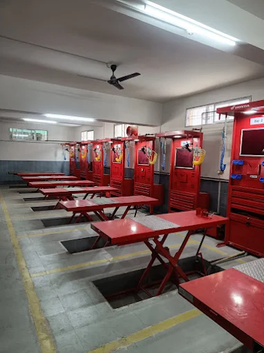 Workshop with hydraulic lifts